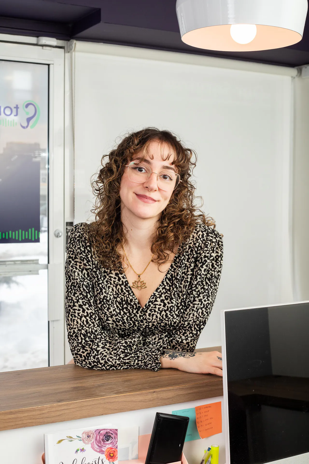 Chantelle Silva at the Toronto Hearing Consultants reception desk