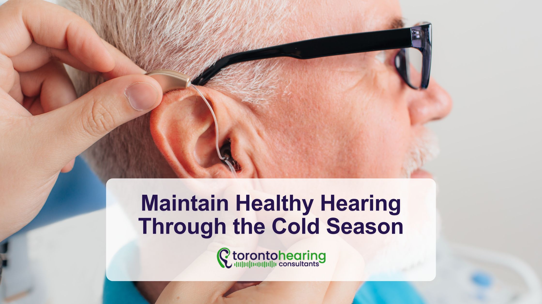 Audiologist fitting a hearing aid for an older man at Toronto Hearing Consultants, emphasizing personalized care and improved hearing health.